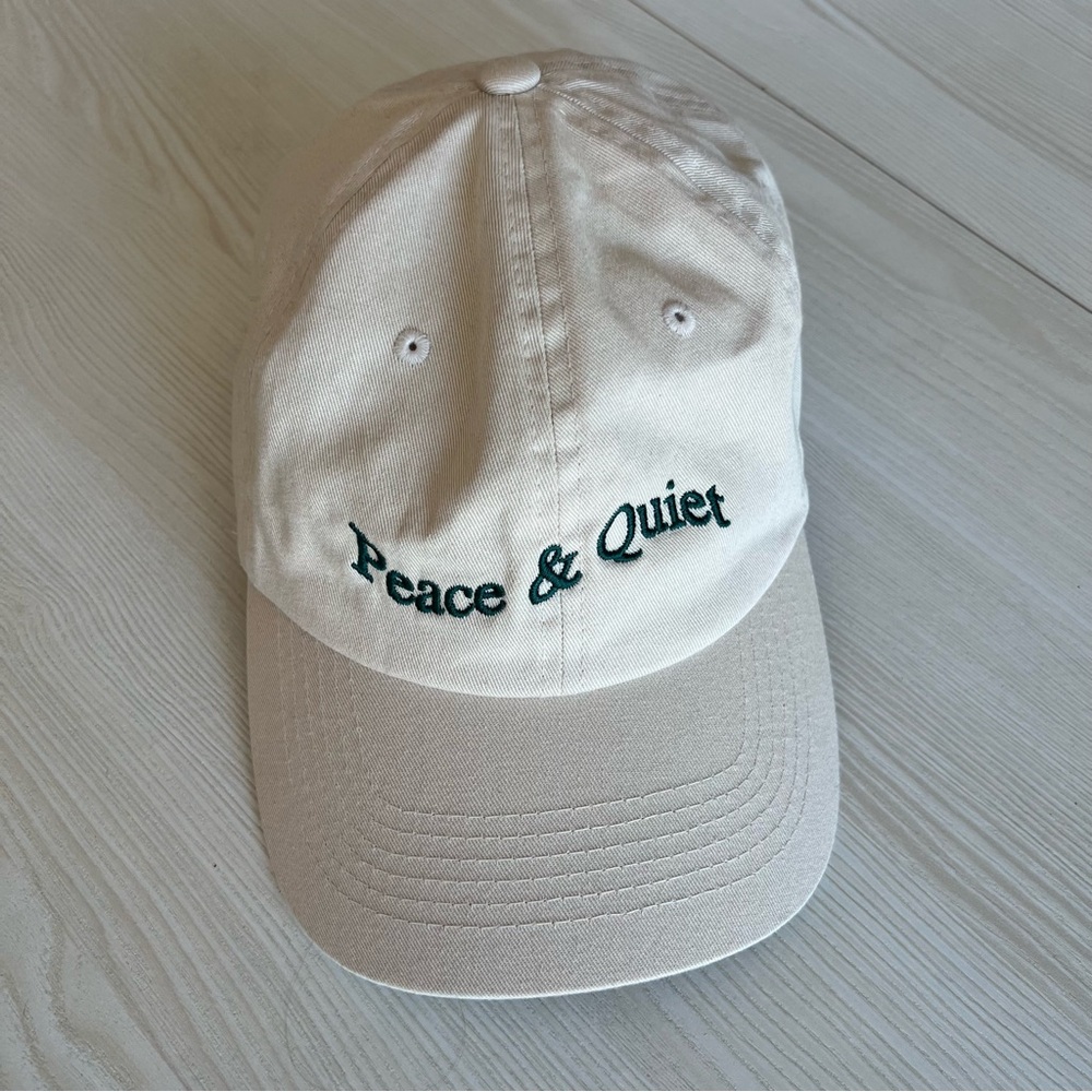 Museum of Peace and Quiet Cream/Green Wavy Wordmark Baseball Cap